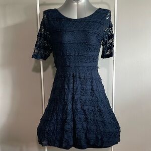 Navy blue knit dress with scoop neck